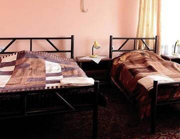 Фото номера Трехместный номер Отель Hotel Miły г. Кросно 3