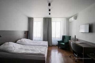Фото номера Двухместный номер Делюкс с 1 кроватью Апарт-отели Glass House г. Кросно 10
